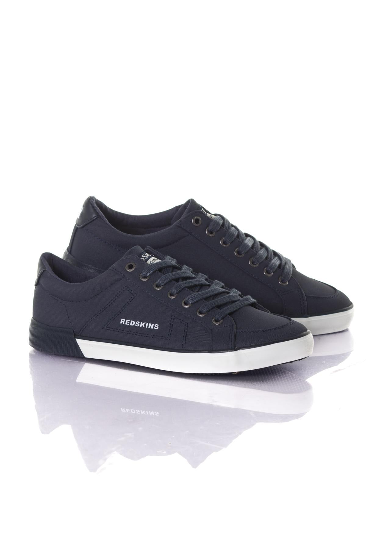 Low-top sneakers in navy canvas - Image n°1