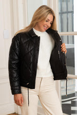 Quilted black sheepskin jacket, zip-fastened with a high neck. - Image n°3