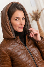 Tailored cognac lambskin puffer, mid-thigh for sleek winter warmth. - Image n°6