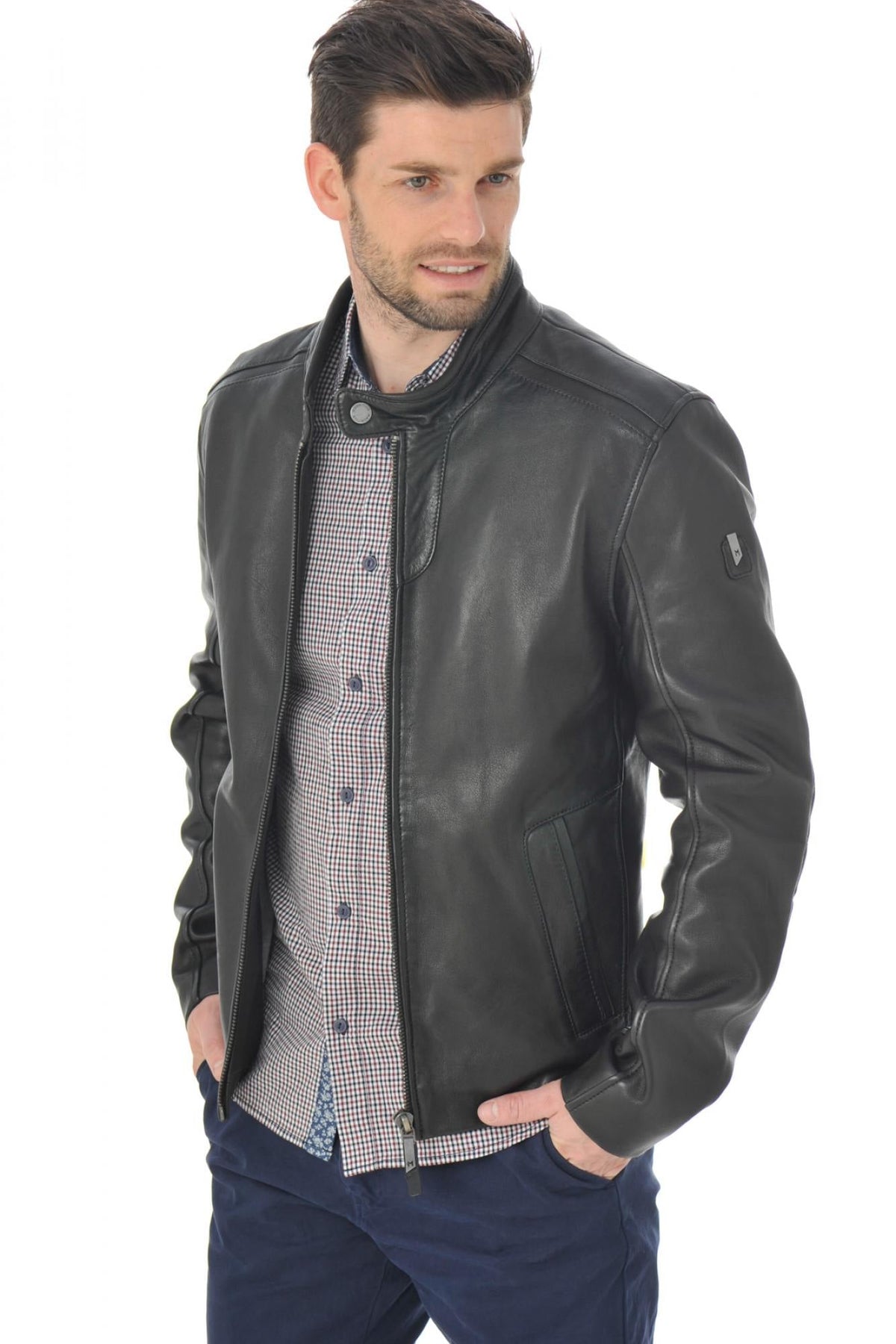 Sleek black lambskin jacket featuring a moto collar and tonal details. - Image n°1