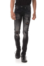 Men's distressed and faded skinny jeans - Image n°1