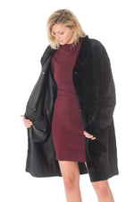 Reversible black lambshearling coat, sleek or fur-lined. Winter warmth - Image n°12