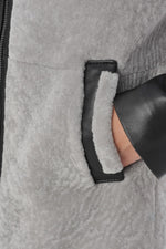 Lambskin and shearling unite in this chic zip-front coat for winter. - Image n°7