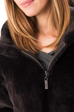 Reversible lambshearling coat in burnished brown-warmth and style. - Image n°11