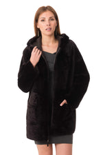Reversible lambshearling coat in burnished brown-warmth and style. - Image n°1