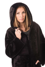 Reversible lambshearling coat in burnished brown-warmth and style. - Image n°9