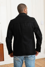 Modern pea coat by Chevignon: vachetta leather sleeves meet wool. - Image n°5