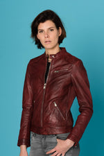 Bold red lambskin jacket with moto details and a slim, flattering fit. - Image n°1