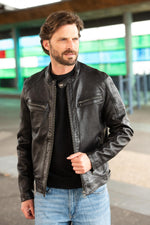 Black lambskin jacket: moto collar, zip details, vintage-washed. - Image n°1