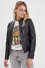 A black lambskin jacket with a moto collar - Image n°1