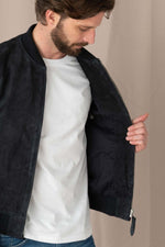 A goatskin jacket with suede finish, teddy collar, and ribbed details. - Image n°8