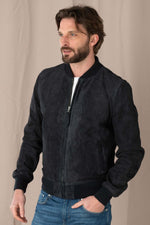 A goatskin jacket with suede finish, teddy collar, and ribbed details. - Image n°4