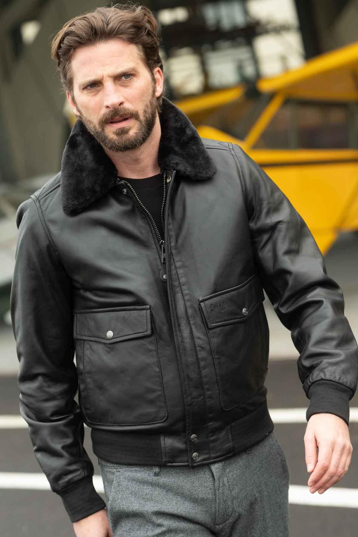 Black lambskin aviator jacket by Schott. Detachable vegan fur collar. - Image n°1