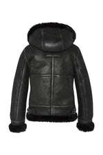 A fitted sheepskin bomber by Schott, lined with fur for winter warmth. - Image n°4