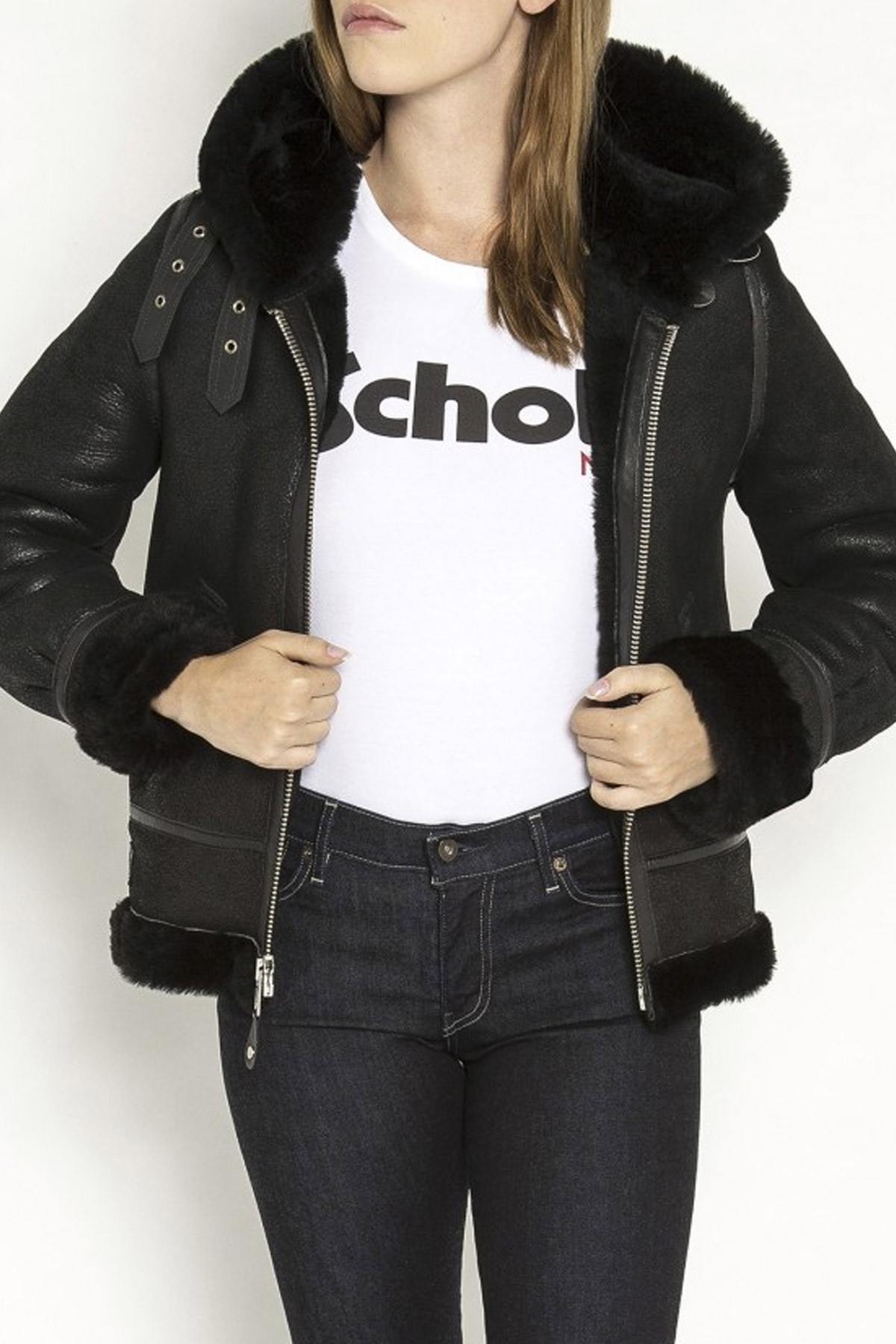 A fitted sheepskin bomber by Schott, lined with fur for winter warmth. - Image n°8