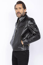 Schott 689H: glossy horsehide, aged brass, and a vintage biker cut. - Image n°1