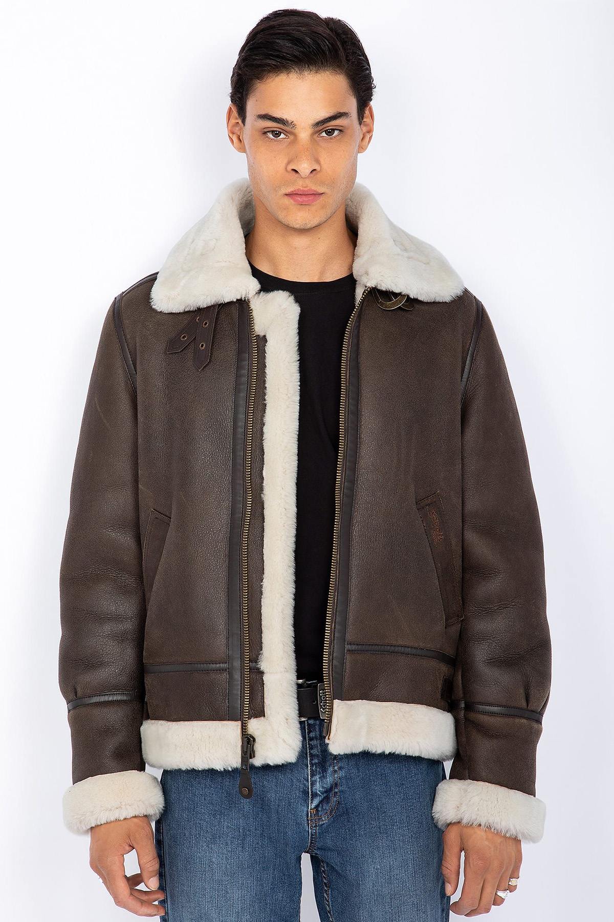 Schott's heavyweight shearling bomber, inspired by WWII aviators. - Image n°1