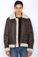 Schott's heavyweight shearling bomber, inspired by WWII aviators. - Image n°1