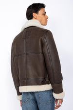 Schott's heavyweight shearling bomber, inspired by WWII aviators. - Image n°3