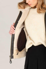 Dark brown sheepskin bomber by Schott, lined with wool for winter. - Image n°6