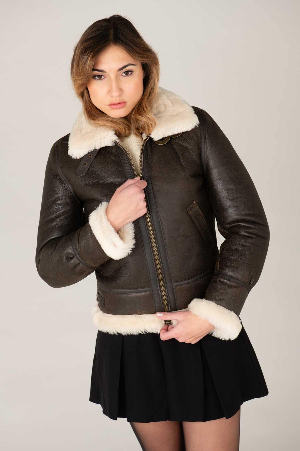 Dark brown sheepskin bomber by Schott, lined with wool for winter. - Image n°1
