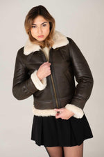 Dark brown sheepskin bomber by Schott, lined with wool for winter. - Image n°1