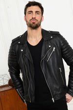 Black lambskin biker jacket with quilted shoulders and asymmetric zip. - Image n°13