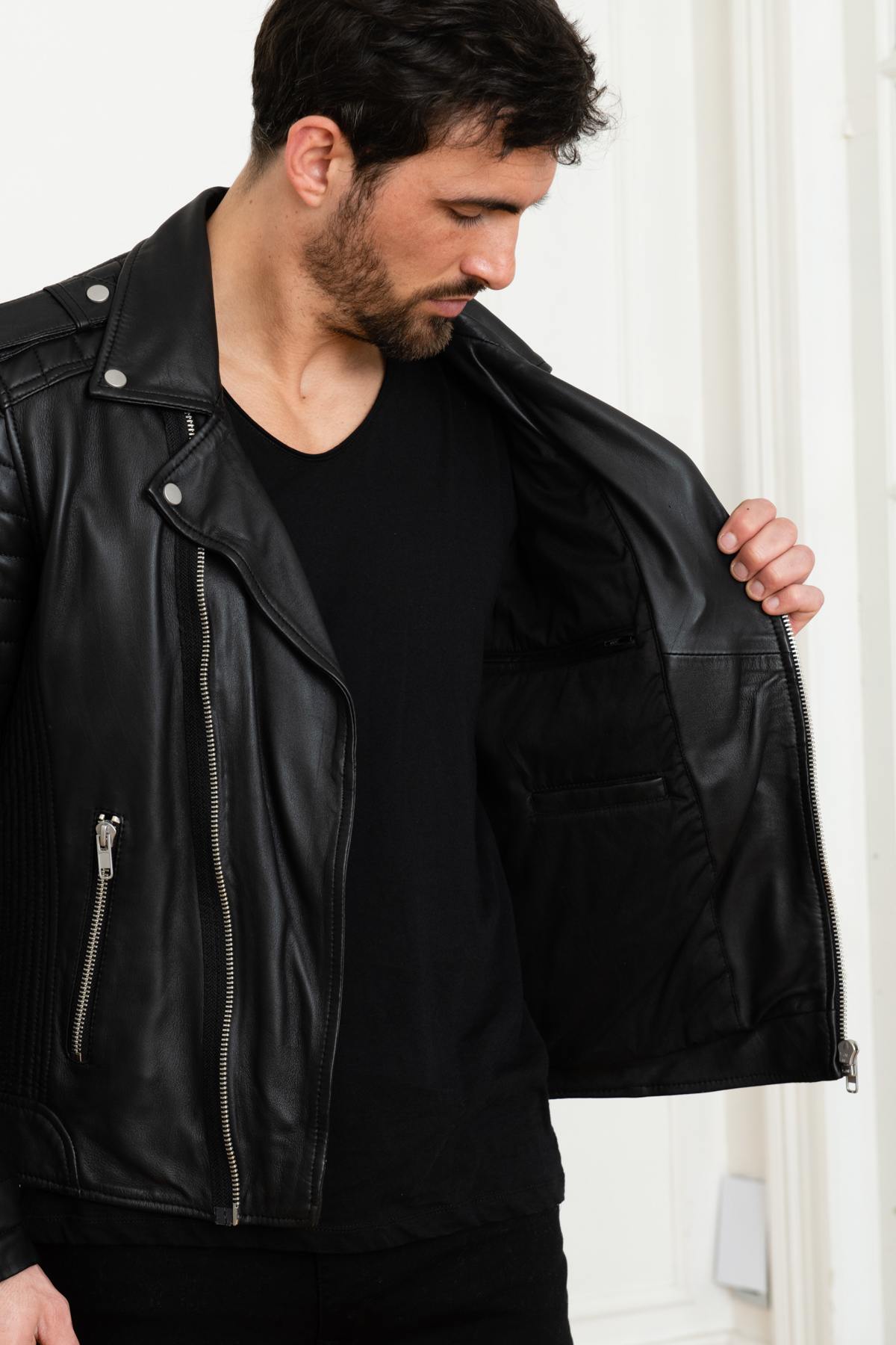 Black lambskin biker jacket with quilted shoulders and asymmetric zip. - Image n°14