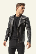 Slim-fit black lambskin biker jacket with matelassage shoulders. - Image n°1