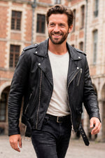 Rock-inspired lambskin jacket in black, slim-cut with silver zips. - Image n°1
