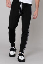 ̈Black jogging pants with white piping - Image n°1