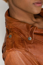 Distressed cognac lambskin biker jacket, cropped with silver details. - Image n°9