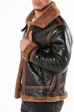 Oiled black sheepskin bomber with cognac shearling lining. - Image n°3