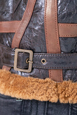 Oiled black sheepskin bomber with cognac shearling lining. - Image n°6