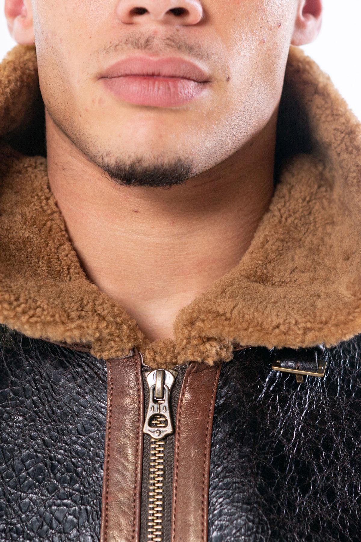 Oiled black sheepskin bomber with cognac shearling lining. - Image n°5