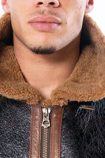 Oiled black sheepskin bomber with cognac shearling lining. - Image n°5