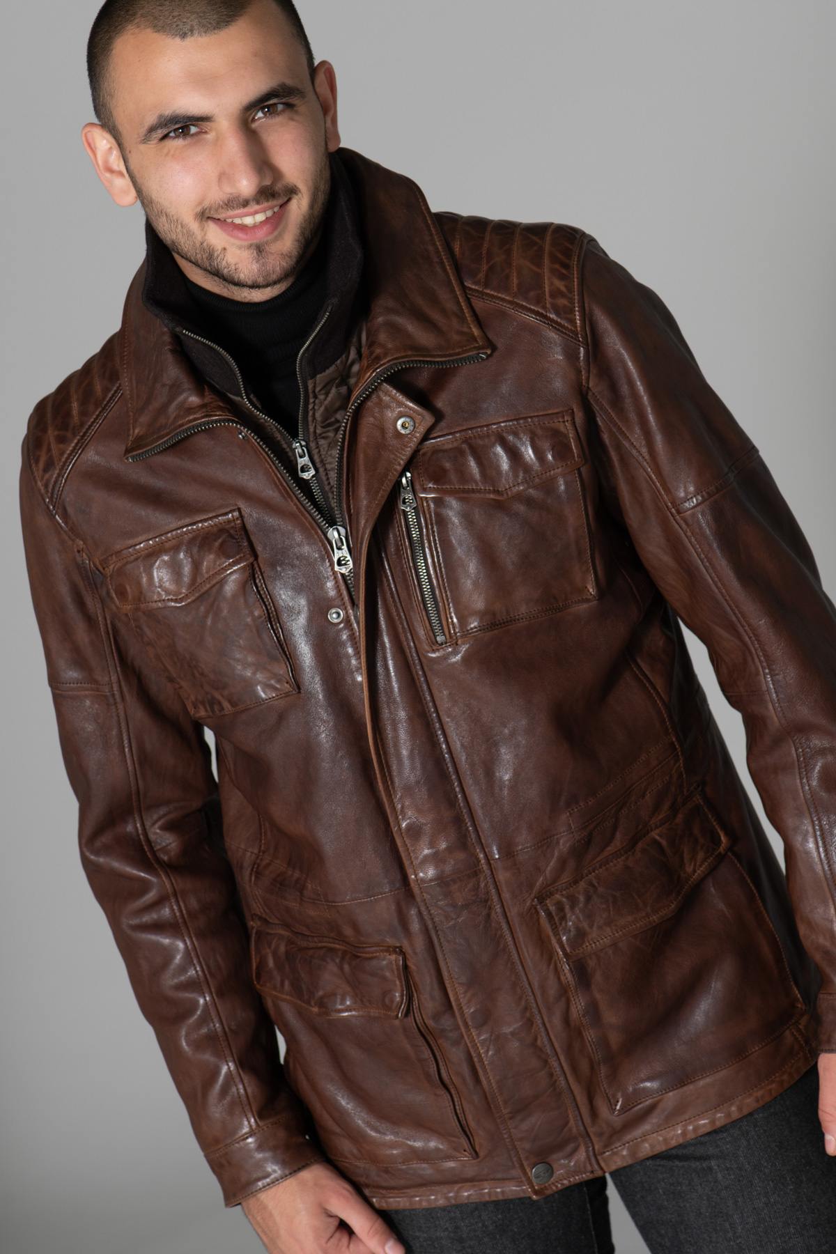 Dark cognac lambskin jacket with a vintage straight cut and sheen. - Image n°1