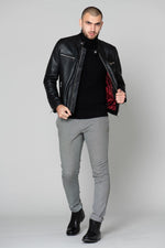 Slim black lambskin jacket with zippered cuffs and burgundy lining. - Image n°2