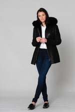 Warm black reversed sheepskin coat with fixed hood and straight fit. - Image n°3