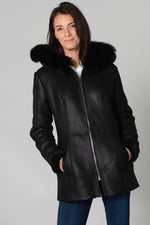Warm black reversed sheepskin coat with fixed hood and straight fit. - Image n°6