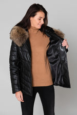 Black lambskin jacket, mid-length with genuine shearling for warmth. - Image n°4