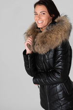 Black lambskin jacket, mid-length with genuine shearling for warmth. - Image n°1