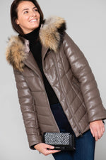 Taupe shearling jacket, mid-length with asymmetrical zip and lining. - Image n°1