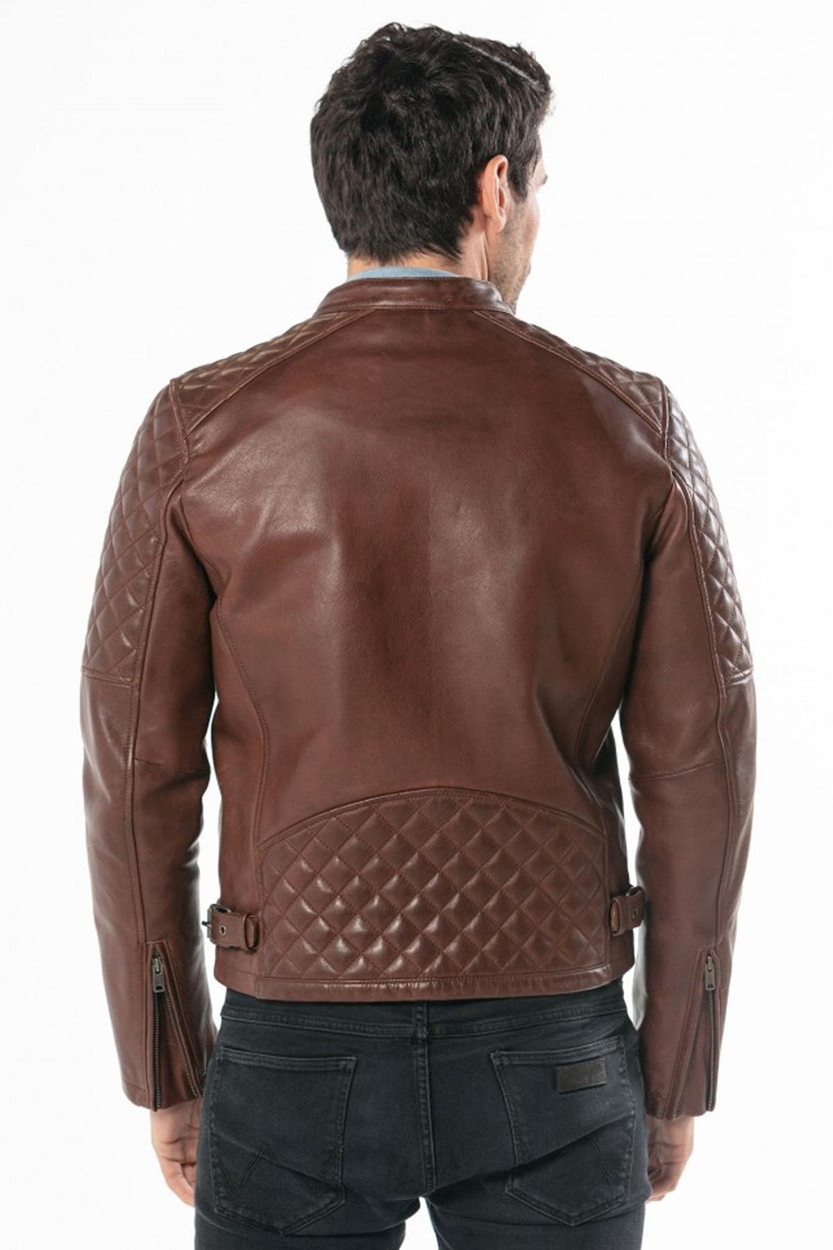 Vegetable-tanned dark cognac cowhide for a biker jacket with edge and character. 68 characters. - Image n°8