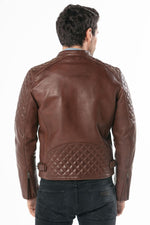Vegetable-tanned dark cognac cowhide for a biker jacket with edge and character. 68 characters. - Image n°8