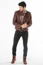 Vegetable-tanned dark cognac cowhide for a biker jacket with edge and character. 68 characters. - Image n°7