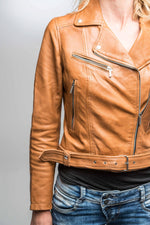 Sleek tan lambskin jacket with a slim biker cut and feminine edge. - Image n°14