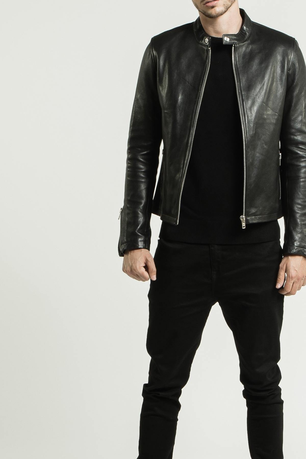 Black lambskin jacket with a semi-matte finish and silver zips. - Image n°13