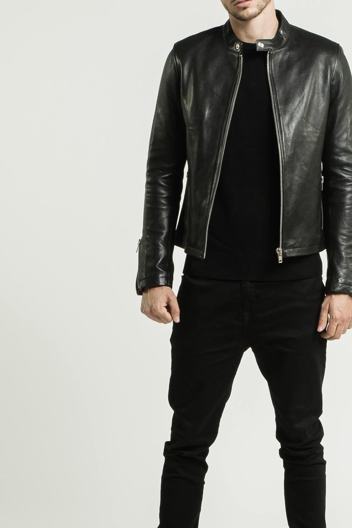 Black lambskin jacket with a semi-matte finish and silver zips. - Image n°13
