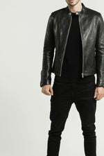 Black lambskin jacket with a semi-matte finish and silver zips. - Image n°13